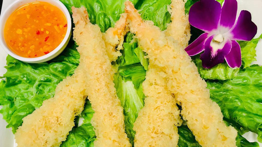 Mango Shrimp · Four Pieces. Crispy shrimp tempura over lettuce with mango dressing.