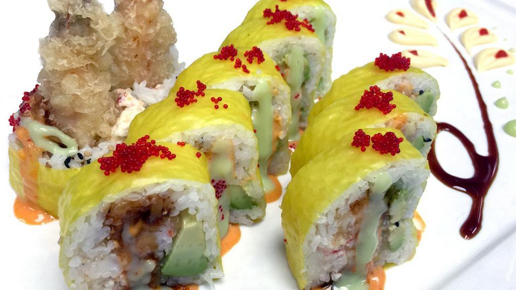 Shooting Star Roll · 10 Pieces. Inside: shrimp tempura, lobster salad and avocado. Outside: yellow soy paper with eel sauce, spicy mayo, wasabi mayo and red tobiko.