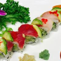 Rainbow Roll · Eight Pieces. Inside: crab meat and cucumber. On top: tuna, salmon, yellowtail, avocado and ...