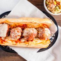 Meatball Sub (Op) · Large meatballs loaded on a hoagie bun, covered in our signature red sauce, topped with our ...