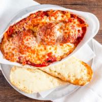 Penne And Meatballs (Op) · Huge meatballs in our signature red sauce on top of penne pasta, served with garlic bread an...