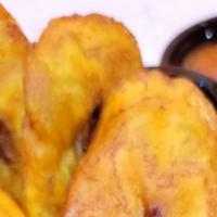 Plantains · Sweet Plantains fried to a golden yellow.