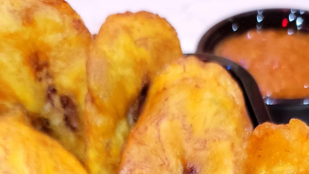 Plantains · Sweet Plantains fried to a golden yellow.