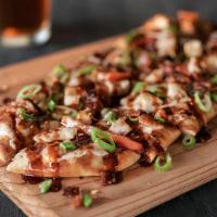 Chipotle Bbq Chicken · Grilled chicken with onions, peppers & bacon smothered in mozzarella cheese. finished with a...