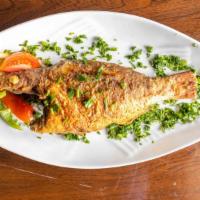 Red Snapper Whole Fish · Grilled or fried (tomato sauce). Served with ocean rice, green salad and home-made sauce.