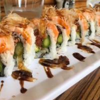 Salmon Aburi Roll · Served spicy. Avocado, spicy tuna, asparagus, cucumber, topped with seared salmon, sliced sw...