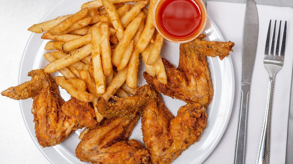 Whole Chicken Wings Special · Comes with french fries and one can of soda.