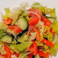 Mediterranean Salad · Cucumbers, tomatoes, onions, and lettuce tossed in olive oil, salt, pepper and lemon juice.