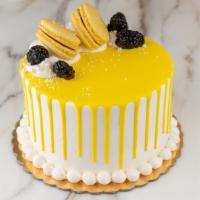Lemon Raspberry Cake · Serves six to eight. Vanilla cake with lemon mousse and raspberry filling.