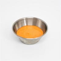 Side Of Sriracha Aioli · Mild-Medium spice level aioli with a splash of lime juice.