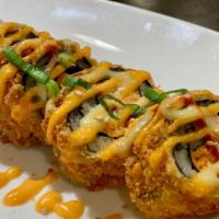 Fried Tuna Roll (8Pcs) · Deep fried spicy tuna and spicy salmon with 3 house sauce on top with crunch.
