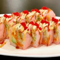 Pink Lady Roll (12Pcs) · Spicy tuna, Shrimp tempura, avocado, cucumber with pink soy paper & house sauces
