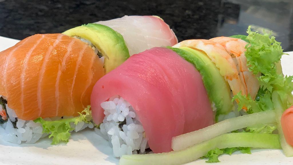 Rainbow Roll (8Pcs) · California roll with tuna, salmon, red snapper, yellow and avocado on top.
