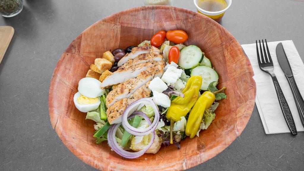 Greek Salad With Grilled Chicken (Small) · Lettuce, Tomato, Onions, Cucumbers, Croutons, Pepperoncini Peppers, Green Peppers, Greek Olives, Chicken, Egg, Feta and Roll.