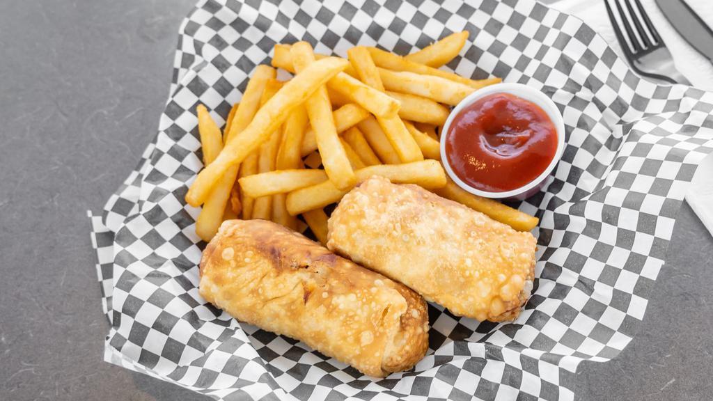 Cheesesteak Egg Rolls With French Fries · 2 cheesesteak egg rolls served with a side of sriracha ketchup sauce and a side of French fries.
