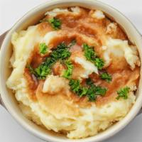 Loaded Mashed Potatoes · Real Mashed potatoes prepared with butter cream, chopped bacon, and cheddar cheese, topped w...