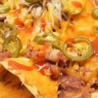 Bean Nachos · Comes with pickled jalapeños.