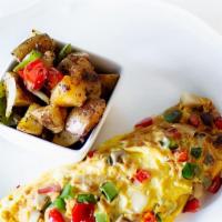 Omelet Bar    · 3 eggs any style with choice of ingredients:
(onion, pepper, tomatoes, mushrooms, spinach, c...