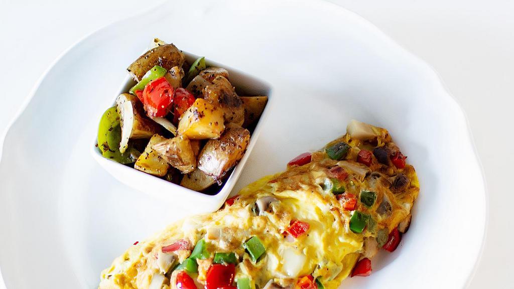 Omelet Bar    · 3 eggs any style with choice of ingredients:
(onion, pepper, tomatoes, mushrooms, spinach, cheese)
served with home potatoes and a choice of bacon,OR  sausage OR avocado
and a toast.