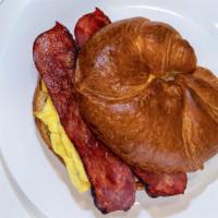 Bacon Egg And Cheese Sandwich · 2 Free range eggs scrambled with choice of bread and cheese (21 grain, Bagel, Croissant, Whi...