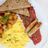 Breakfast Platter  · 2 Free range eggs any style served 
with bacon, sausage and homemade potatoes 
with a choice...