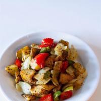  Side Of Breakfast Potatoes · Side of our delicious home potatoes Sauteed with onions ,green and red bell pepper .