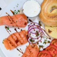 Smoked Salmon Platter · Smoked salmon served with cream cheese, capers, tomato slices and a choice of a bread
