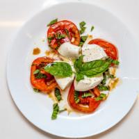 Caprese Panini Sandwich · Fresh mozzarella, sliced plum tomatoes, fresh basil, olive oil, balsamic vinegar on ciabatta...