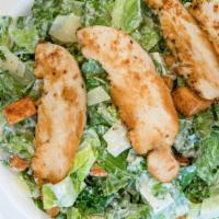 Grilled Chicken Caesar Salad · Freshly cut kale mixed with romaine salad, croutons and homemade Caesar dressing served with...