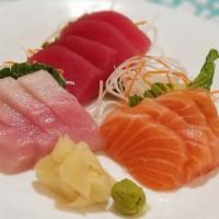 3 Color Sashimi Combo · Four tuna, four salmon and four yellow tail sashimi.

Consuming raw or undercooked meats, se...