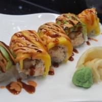 Hawaii Roll · Tempura shrimp , white crabmeat, top with avocado, mango, eel sauce and spicy mayo.