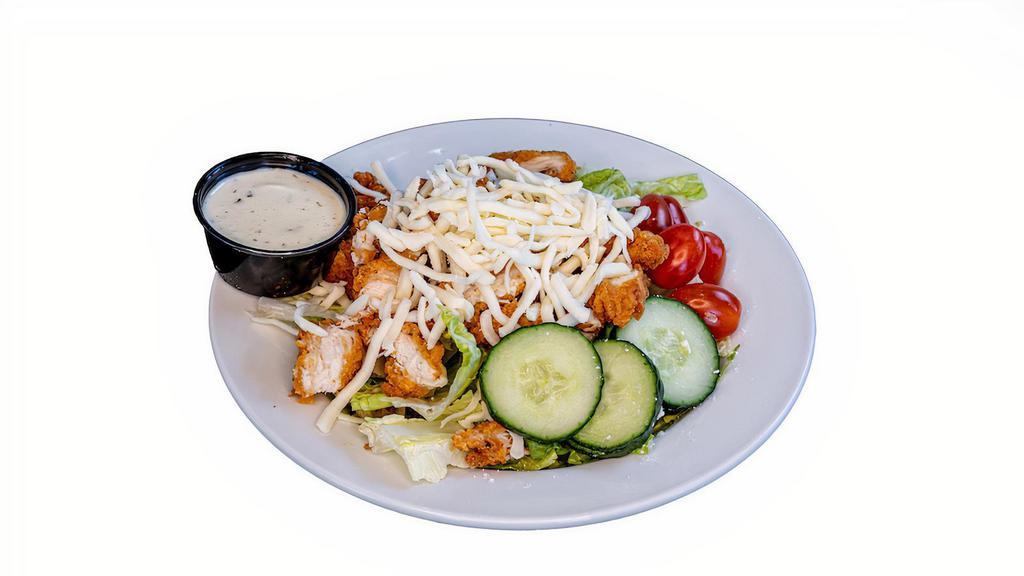 Crispy Chicken Salad · Crispy chicken, romaine lettuce, grape tomatoes, cucumbers, carrots and croutons.
