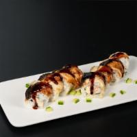 Dragon Roll · Snow crab, cucumber, avocado With fresh water eel on top With eel sauce.