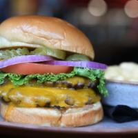 High Rail Burger · Two 4 oz smashed beef patties, cheddar cheese, lettuce, tomato, onion, and pickles on a brio...