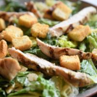 Full Grilled Chicken Caesar Salad · Chopped romaine, grilled chicken breast, parmesan cheese and croutons
tossed in Caesar dress...