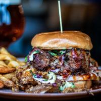 The Engineer · BBQ Sandwich loaded with smoked pulled pork, layers of hickory smoked sliced turkey and juic...