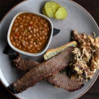 Two Meat Plate · Your choice of two meats and one side served with Texas toast (1/4 lb of Prime brisket, slic...