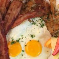 Two Egg Breakfast · with choice of bacon, banger sausage (contains gluten), or turkey kielbasa, hash brown potat...