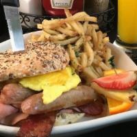 3 Little Pigs Bagel · Plain or Everything bagel served with bacon, ham, banger sausage (contains gluten), 2 eggs s...