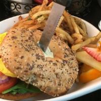 Smoked Salmon & Bacon Bagel · Plain or Everything bagel with capers, tomato, red onion, scrambled egg, and dijon-cream che...