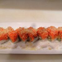 Ashley Roll · Shrimp tempura & cucumber inside with grilled spicy crab meat & fish egg on top.
