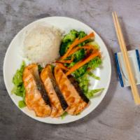 Teriyaki Salmon · With veg, rice and salad.