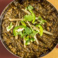 Palak Paneer · Spinach and cottage cheese cooked with spices