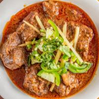 Nihari · Chunks of beef and shanks cooked in curry