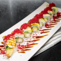 Dancing Shrimp Roll · Shrimp tempura, cucumber top with cooked shrimp and avocado ganish with red crunch eel sauce.