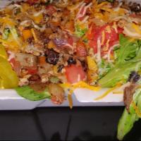 Texas Garden Salad · The works philly steak or chicken, fried chicken, grilled chicken cheese, sautéed in bell pe...