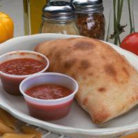 Create A Calzone · Fresh dough filled with mozzarella and ricotta cheese filled your choice of toppings . Serve...