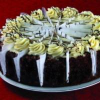 Red Velvet Cake · Three layers of dark red velvet cake is filled and iced with our rich cream cheese icing.  F...