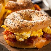 The Classic Breakfast Sandwich · 2 fresh cracked cage-free eggs cooked any style and cheddar cheese with choice of bacon, sau...