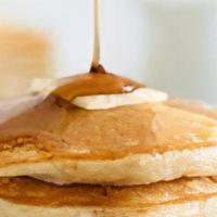 Pancakes · Delicious fluffy pancakes with butter and maple syrup.